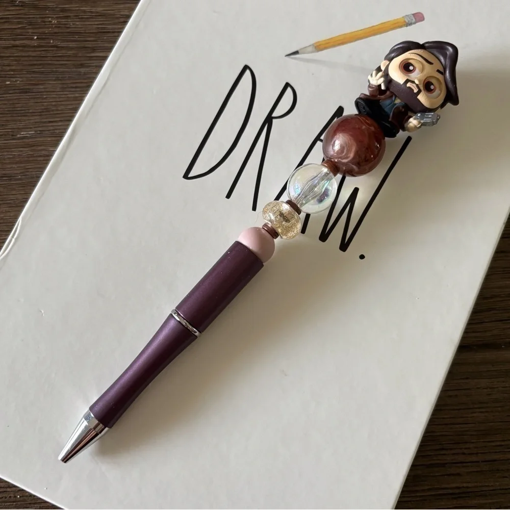 Disney Doorables: Star Wars: Cassian Andor (teen) handmade beaded pen